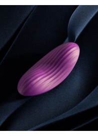 Фиолетовый клиторальный стимулятор Edeny с управлением через приложение - Svakom